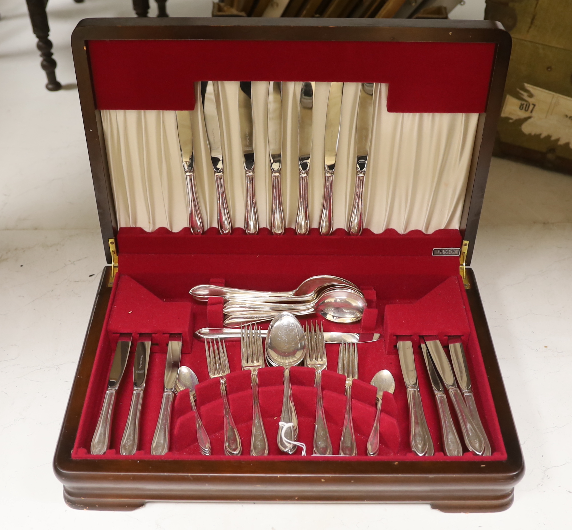 A wooden canteen and Sheffield Viners EPNS cutlery set for eight